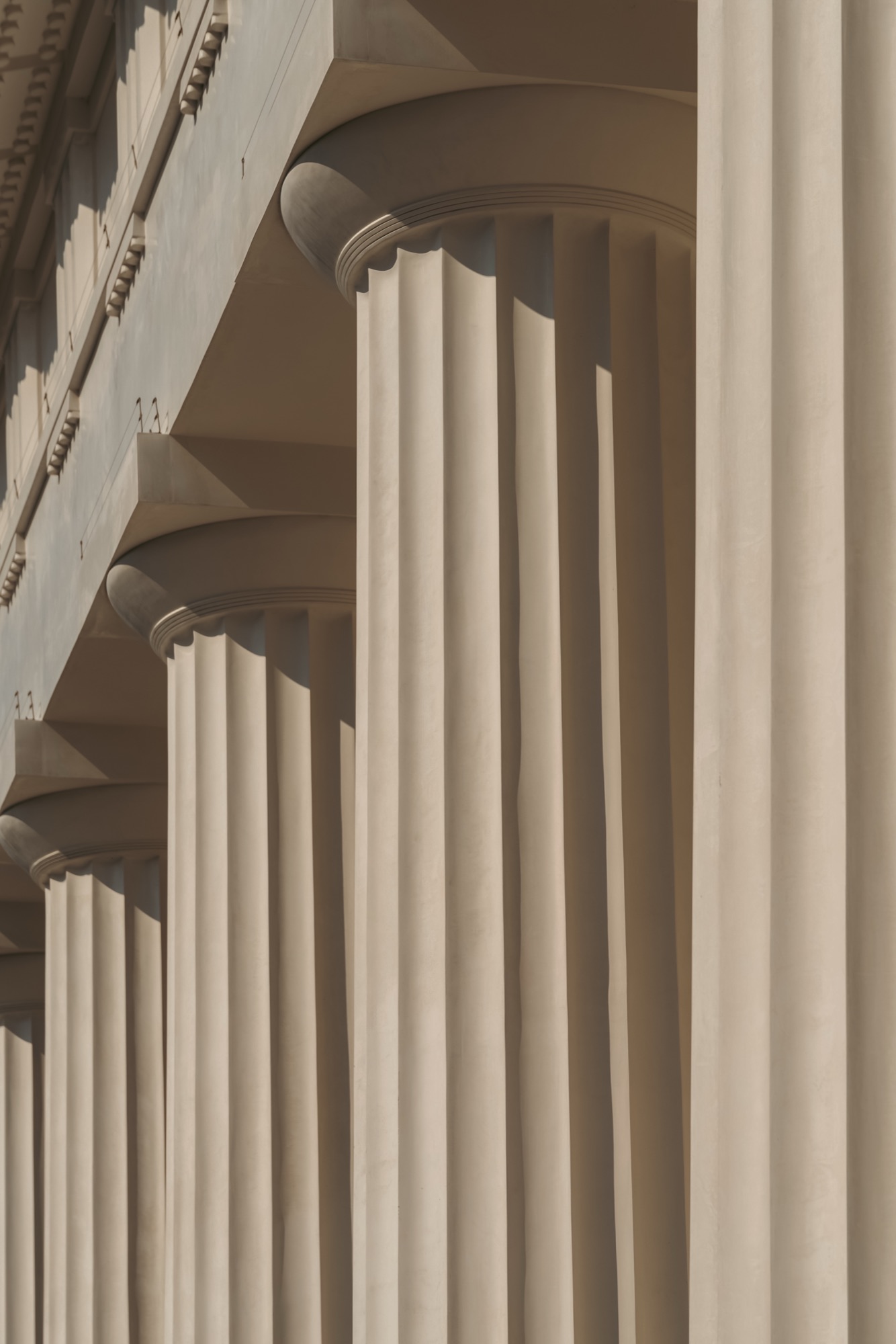 A colonnade of classical stone columns