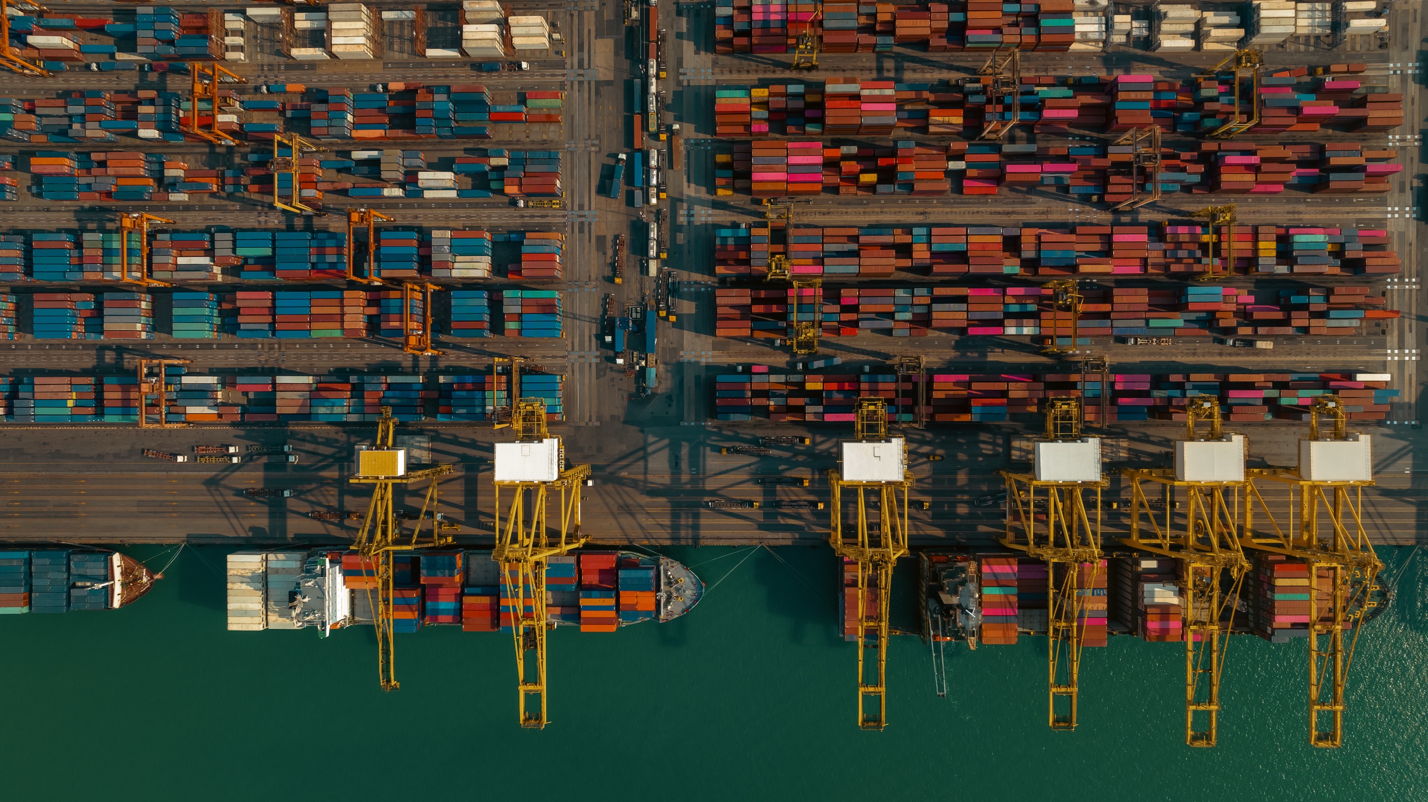 An aerial panorama of a commercial container port