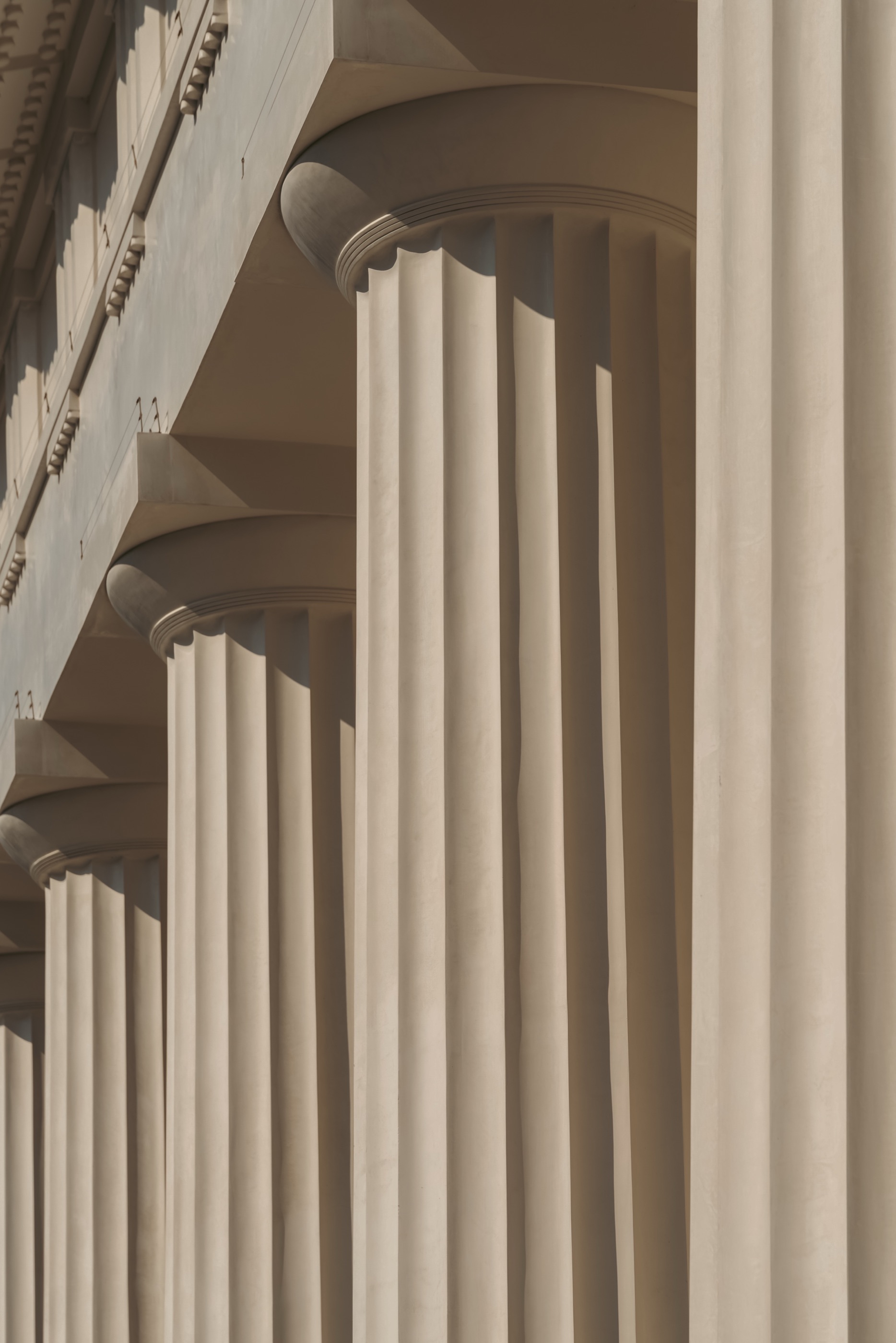 A colonnade of classical stone columns